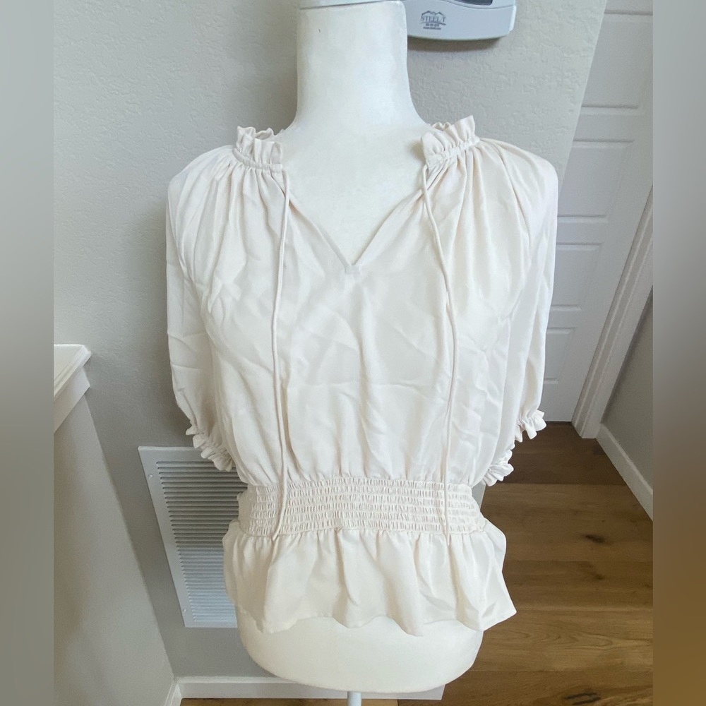 Anna Taylor white top.